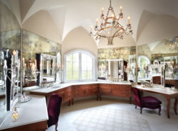 Primary bathroom with a groin-vault ceiling, chandeliers, antique glass, and Italian mirros